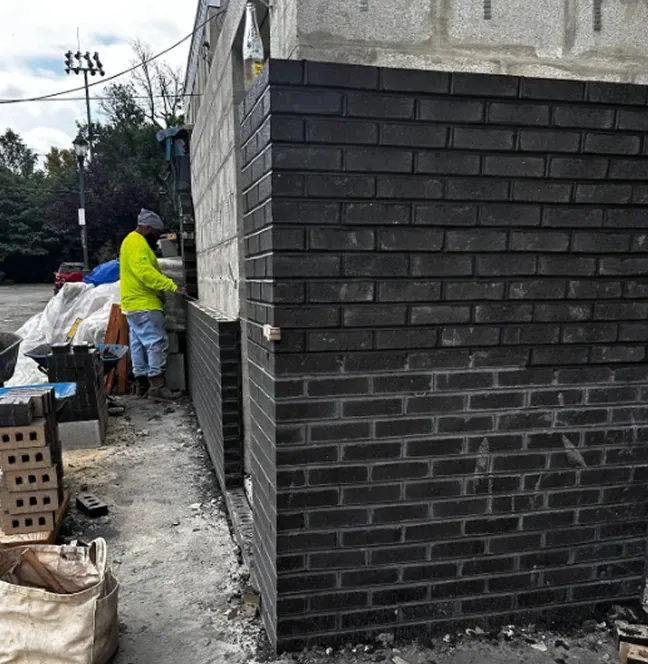 Veneer wall going up