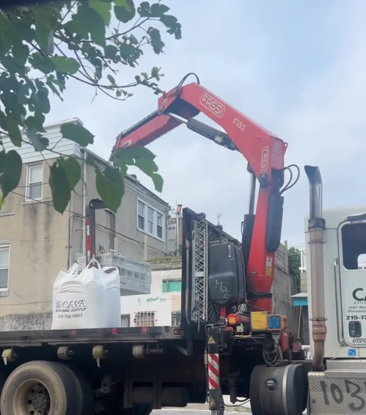 Supersack delivery by boom truck